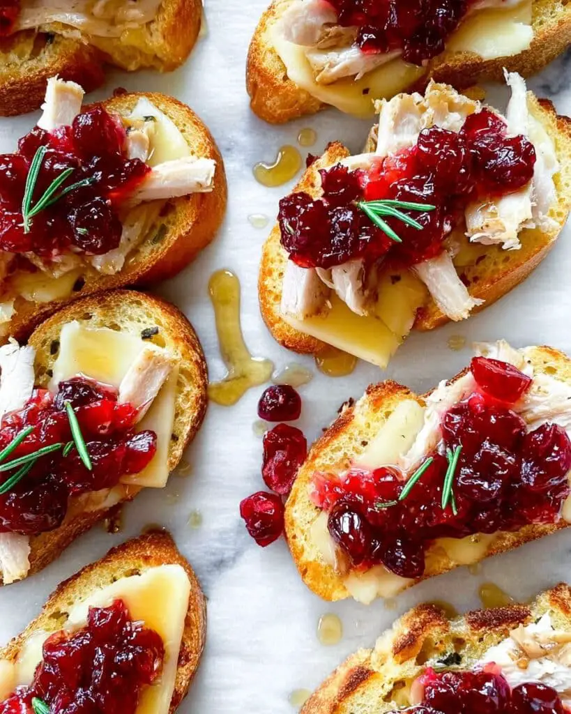 Melted Swiss, Turkey, and Cranberry Crostini Recipe