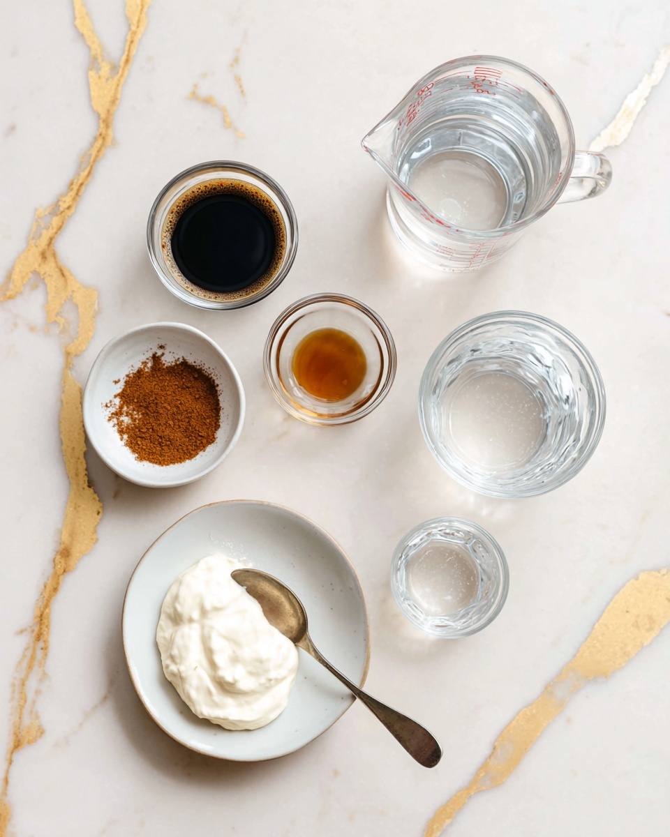 A clear glass cup filled with light brown tea, smooth and creamy on the surface, sitting on a white marbled surface with gold veins. The glass cup has a handle on the right side and the tea fills the cup almost to the top, creating a clean and shiny look. The lighting highlights the glass’s transparency and the rich color of the tea inside. photo taken with an iphone --ar 4:5 --v 7