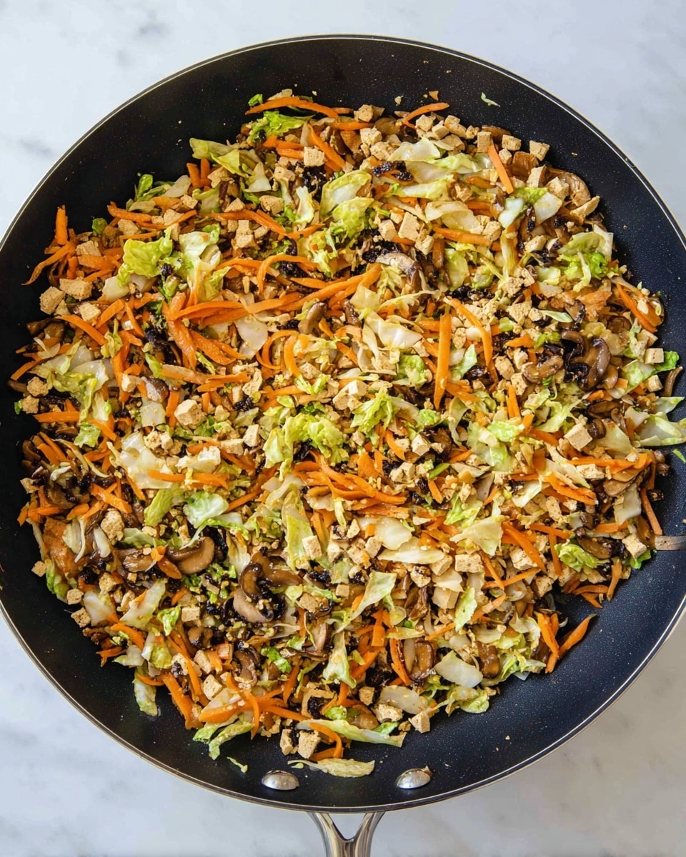 Five translucent spring rolls are placed on a large white plate with ridged edges set on a white marbled surface. Each spring roll shows inside layers of orange shredded carrots, light beige tofu or a similar filling, bits of green vegetables, and dark specks that might be mushrooms or seaweed. The rolls have a soft and slightly shiny texture with visible folds where the rice paper wraps overlap. The rolls are arranged with no clear pattern but spaced enough to see each individually. photo taken with an iphone --ar 4:5 --v 7
