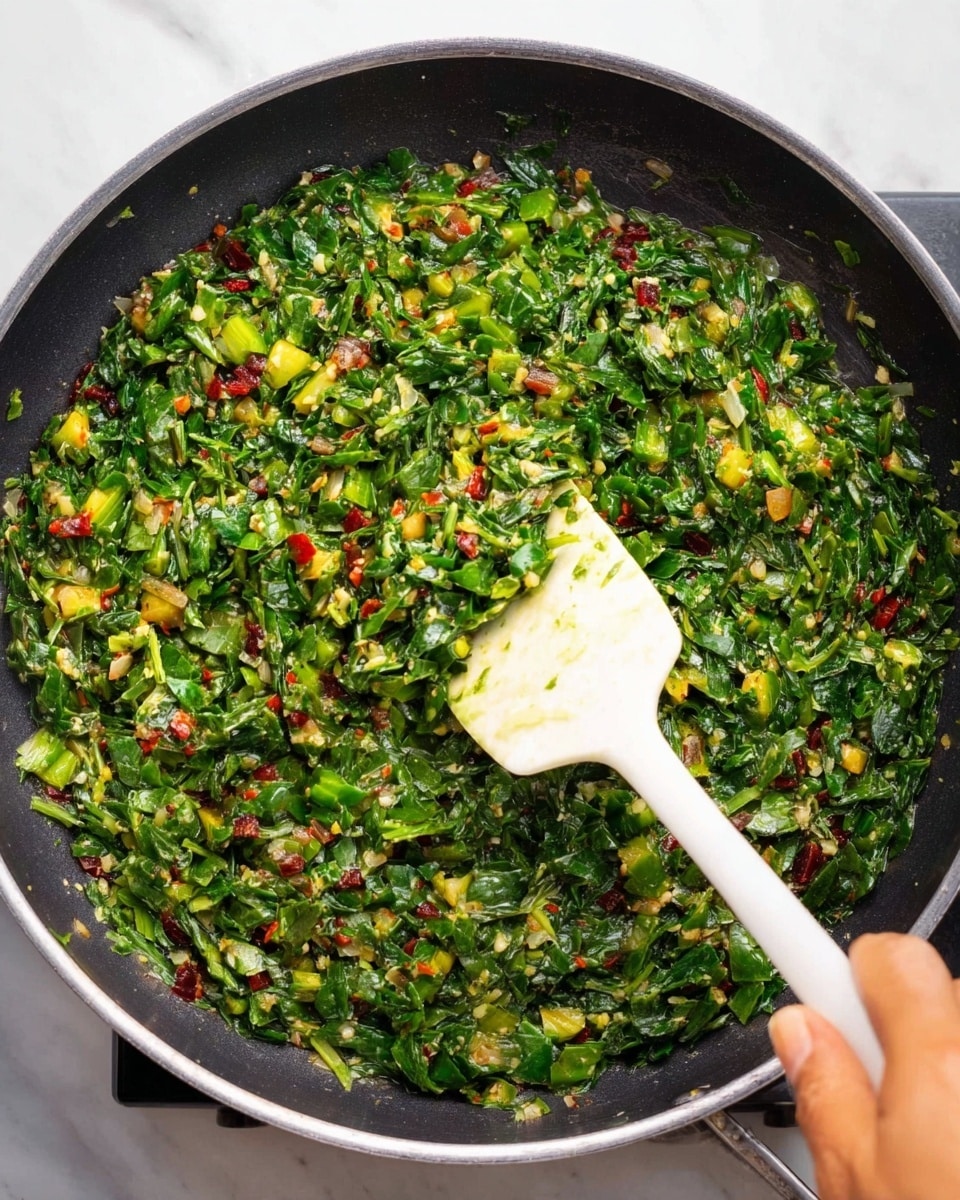 The image shows five triangular pieces of a dark green and brown baked dish on a white oval plate set on a white marbled surface. Each piece has a rough, textured top layer with visible chunks of red and black dried berries and small bits of crushed light brown nuts sprinkled evenly. The inside of the pieces is green with bits of greens visible, showing a denser, moist texture beneath the browned, firm crust. Some berry and nut crumbs are scattered around the plate and surface. The lighting highlights the rough texture and rich colors of the dish. photo taken with an iphone --ar 4:5 --v 7