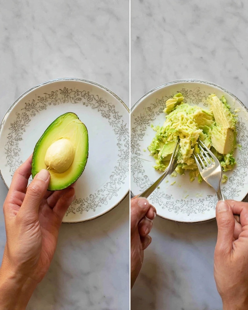 A white bowl filled with fresh green watercress leaves arranged around the edges. On one side, there are several halved eggs with bright purple-pink outer rims and creamy yellow yolks sprinkled with pepper. In the center, there is a scoop of light green mashed avocado, topped slightly with a drizzle of olive oil and small green leaves. Scattered among the watercress are small purple and pale yellow edible flowers, adding pops of soft color. The bowl sits on a white marbled surface. photo taken with an iphone --ar 4:5 --v 7