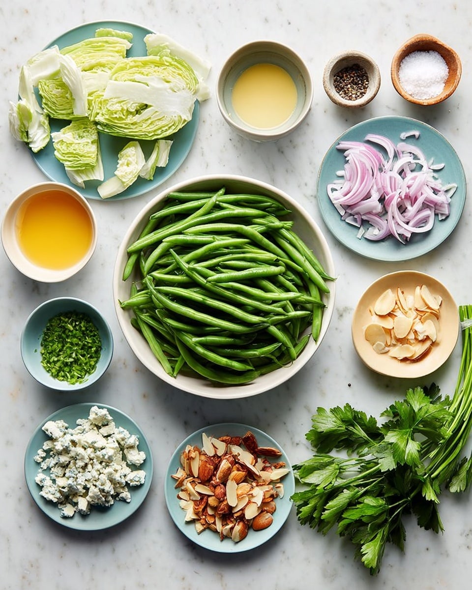 A group of white bowls and plates on a white marbled surface, each filled with different ingredients arranged neatly. In the center, a large white bowl is full of fresh green beans, bright and smooth. Around it, there are smaller plates holding light green endive leaves, creamy blue cheese crumbles, thin slices of red onion, chopped bright green chives, golden brown fried shallots, and sliced light brown almonds. There are also small white bowls containing yellow oil, a creamy pale yellow sauce, and light yellow vinegar. Two tiny round bowls hold black pepper and white salt. On the side, a bunch of fresh dark green parsley adds more color. Everything looks clean and fresh. Photo taken with an iphone --ar 4:5 --v 7