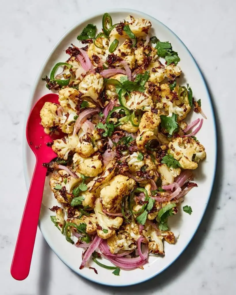 Roasted Cauliflower Salad with Dried Cherries, Pine Nuts, and Citrus Recipe