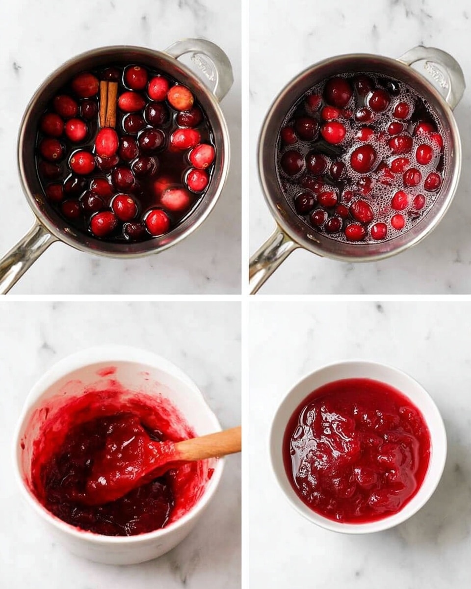 A round dessert sits on a white plate placed on a white marbled surface, showing three clear layers: the bottom layer is a thick, crumbly golden-brown crust, the middle layer is a thick, creamy white filling, and the top layer is a mix of red fruit sauce swirled with the cream just below a heap of dark red and purple berries dusted with white sugar crystals, all topped slightly higher in the center. The background includes a white flower pot with green leaves, white mugs, and wooden kitchen tools, giving a clean and bright setting. Photo taken with an iphone --ar 4:5 --v 7
