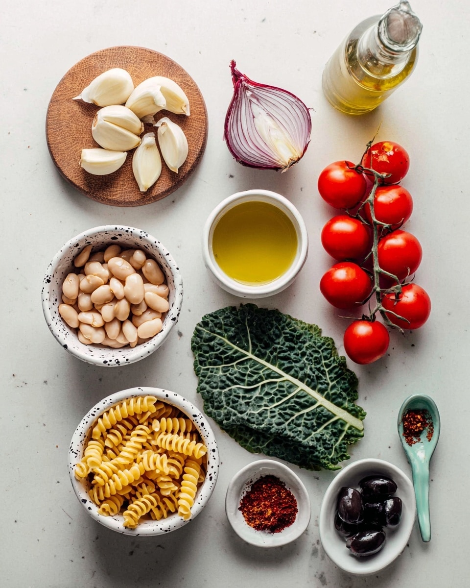 The image shows eight ingredients arranged neatly on a white marbled surface. At the top left, five peeled white garlic cloves rest on a small round wooden board. Below the garlic, a white bowl with black spots is filled with pale beige white beans. Next to it, a small white bowl holds greenish-yellow olive oil. Above the oil, a halved shallot shows its purple and white layers. To the right of the shallot, a bright red vine of eight cherry tomatoes lies beside a large textured green leafy kale leaf. Below the tomatoes and kale, a small white speckled bowl contains dry yellow spiral pasta. To its left, a small white bowl is filled with dark olives. At the right edge near the bottom, a bottle with pale yellow liquid is visible. Above the bottle, a turquoise ceramic spoon holds red chili flakes, and next to it is a black spoon with coarse white salt. photo taken with an iphone --ar 4:5 --v 7