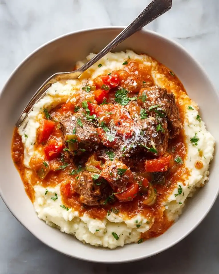 Creamy Italian Sausage and Peppers Over Mashed Potatoes Recipe