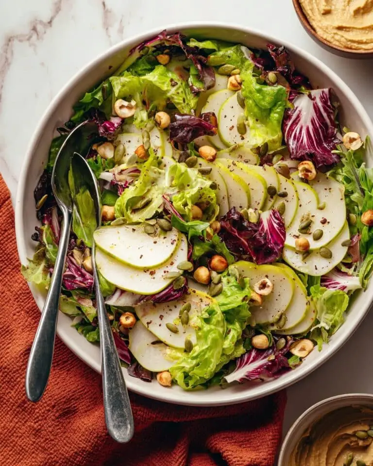 The Perfect 15-Minute Salad with Pears, Toasted Nuts, and Vegan Goat Cheese Recipe