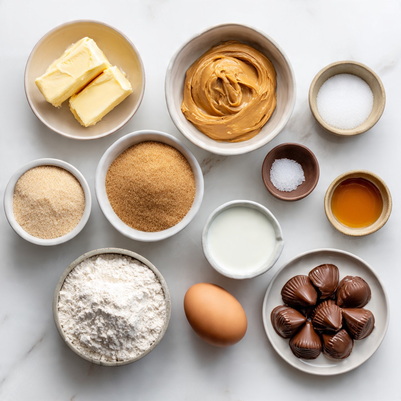 The image shows a pile of peanut butter cookies with a Hershey's kiss chocolate on top of each. The cookies have a light golden brown color with a sugar-coated texture and slight cracks on the surface. The Hershey's kiss chocolates are smooth, shiny, and dark brown, positioned upright in the center of each cookie. They are arranged in a small heap on a white plate with a red rim and faint holiday-themed decorations. In the background, more cookies lie on a black wire cooling rack over a white marbled surface, with a blue cloth partially visible. The photo is taken with an iphone --ar 4:5 --v 7