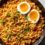 Creamy Buldak Noodles with Garlic, Mozzarella, and Spring Onions Recipe