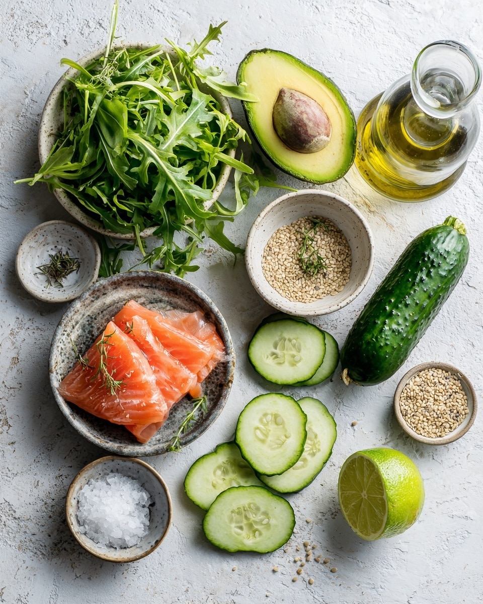A wooden bowl filled with fresh green arugula leaves forming a base layer, topped with slices of light green avocado arranged on top, and thin pieces of pink smoked salmon scattered evenly across the salad. White sesame seeds are sprinkled over the entire dish, adding small speckled texture. The bowl sits on a beige cloth with a white marbled surface underneath, and in the background, there is a blurred glass with a yellow dressing and green apples. photo taken with an iphone --ar 4:5 --v 7