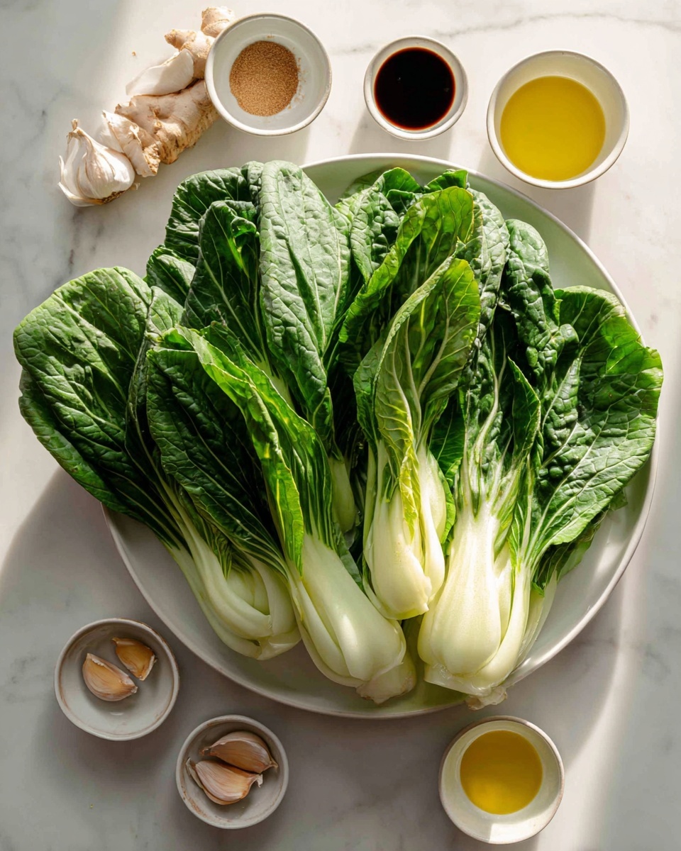 The image shows a white plate full of fresh green bok choy with bright white stems and dark green crinkled leaves, placed on a white marbled surface. Around the plate, there are five small cups with different ingredients: one with dark soy sauce, another with two light brown garlic cloves, a third with light brown powder, a fourth with yellow olive oil, and the last one with a light tan liquid. The lighting creates sharp shadows and highlights the textures of the vegetables and ingredients, giving everything a fresh and natural look. Photo taken with an iphone --ar 4:5 --v 7
