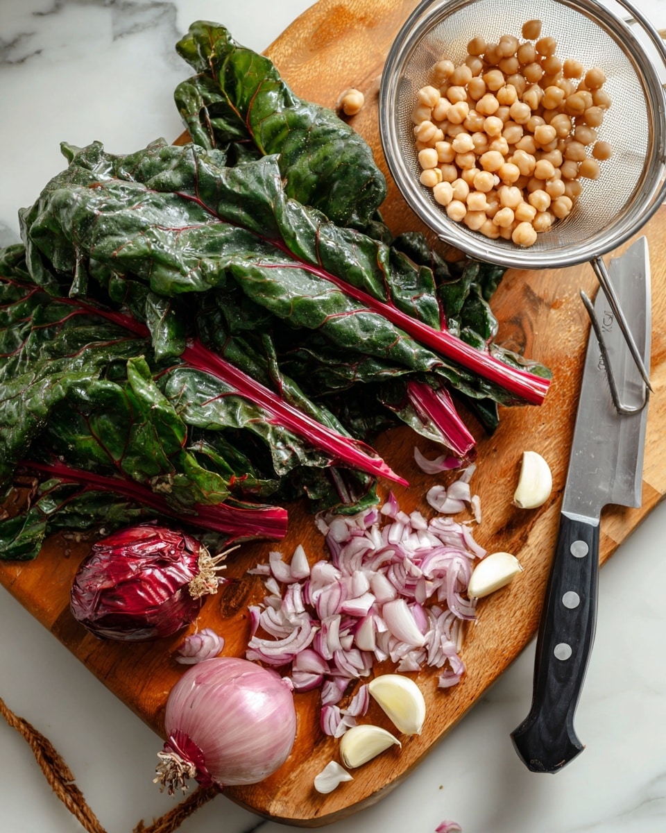 A white bowl filled with a dish showing three main layers: the bottom layer is leafy green cooked spinach with some red stems mixed in, the middle layer has light beige chickpeas scattered throughout, and the top layer includes thin white onion slices and small chunks of white cheese sprinkled over everything. Two lemon wedges rest on the right and bottom edges of the bowl. The bowl sits on a white marbled surface with a white spoon visible to the top left. Photo taken with an iphone --ar 4:5 --v 7