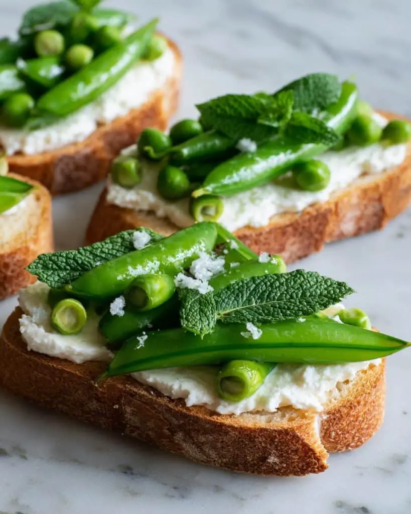 Snap Pea Crostini with Ricotta, Lemon, and Fresh Mint Recipe
