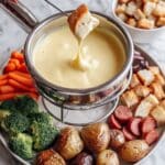 Cheese Fonduewith Gouda, Gruyere, and Emmental Recipe