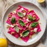 Beet Pasta with Vegan Feta, Roasted Garlic, and Basil Recipe