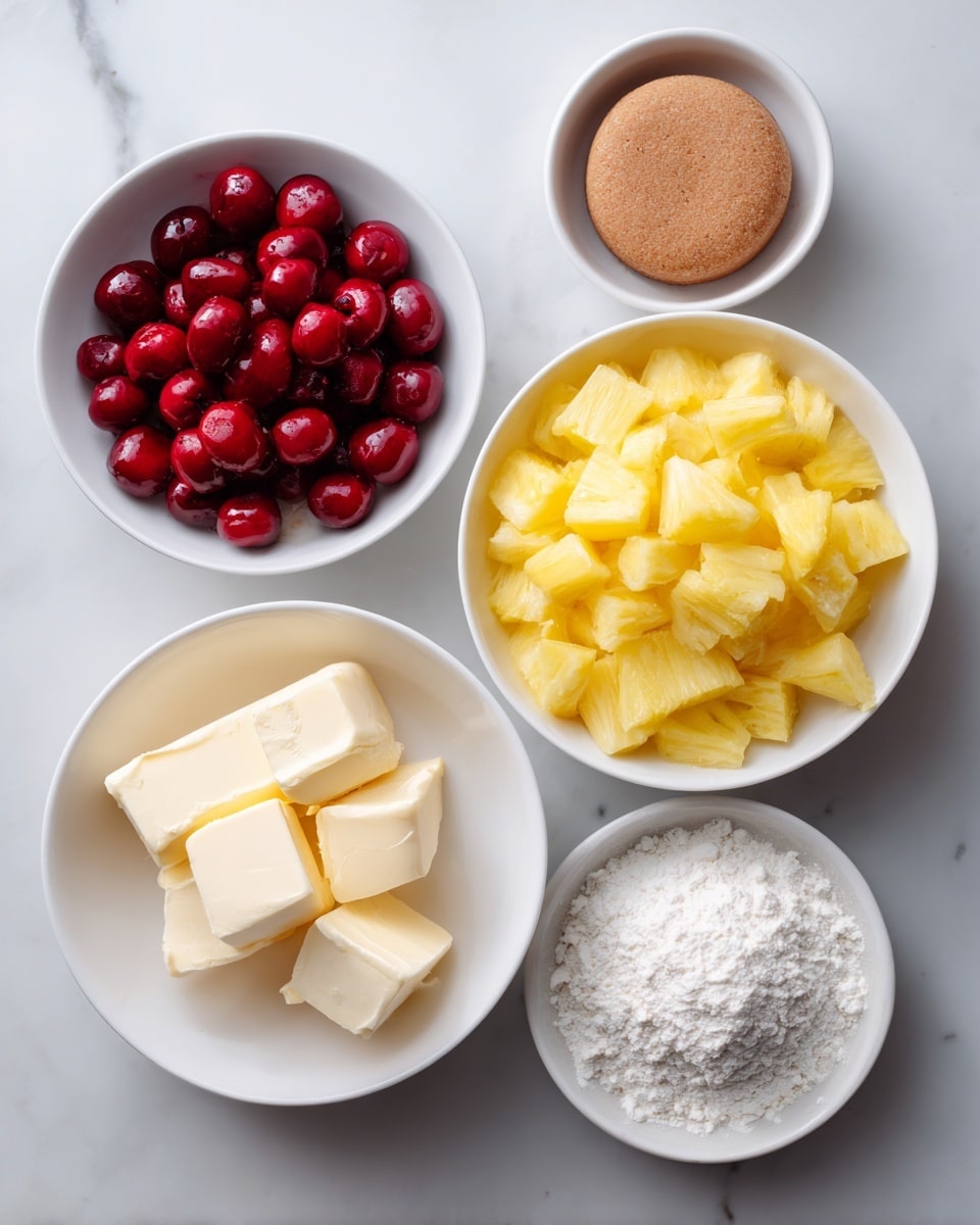 The image shows a white rectangular dish filled with two visible layers of food. The bottom layer is made of small yellow and light orange pieces of fruit, likely pineapple, spread evenly across the dish. The top layer consists of bright red cherries placed in an even scattered pattern on top of the fruit. The dish is set on a white marbled surface. Photo taken with an iphone --ar 4:5 --v 7