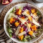 Winter Roasted Butternut Squash Salad with Kale, Pomegranate, and Candied Nuts Recipe