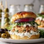 Kofta Burgers with Grilled Onions, Feta, and Fresh Tzatziki Recipe