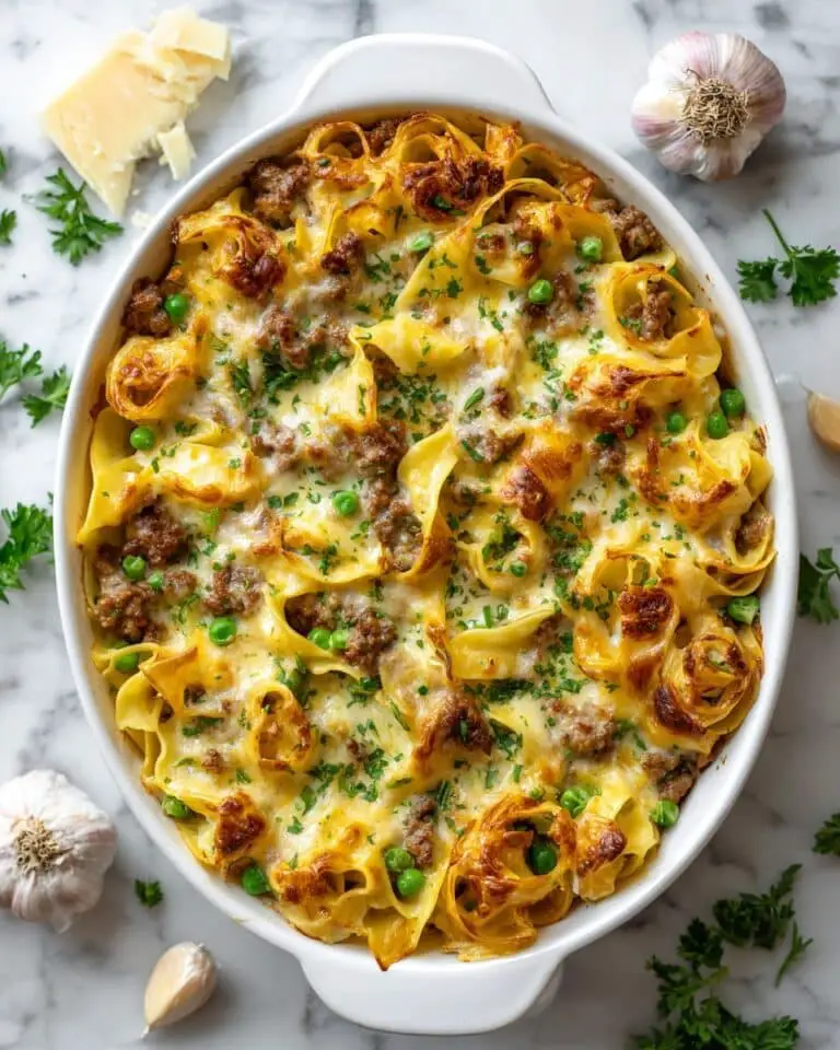 Creamy Ground Beef Stroganoff with Egg Noodles and Peas Recipe