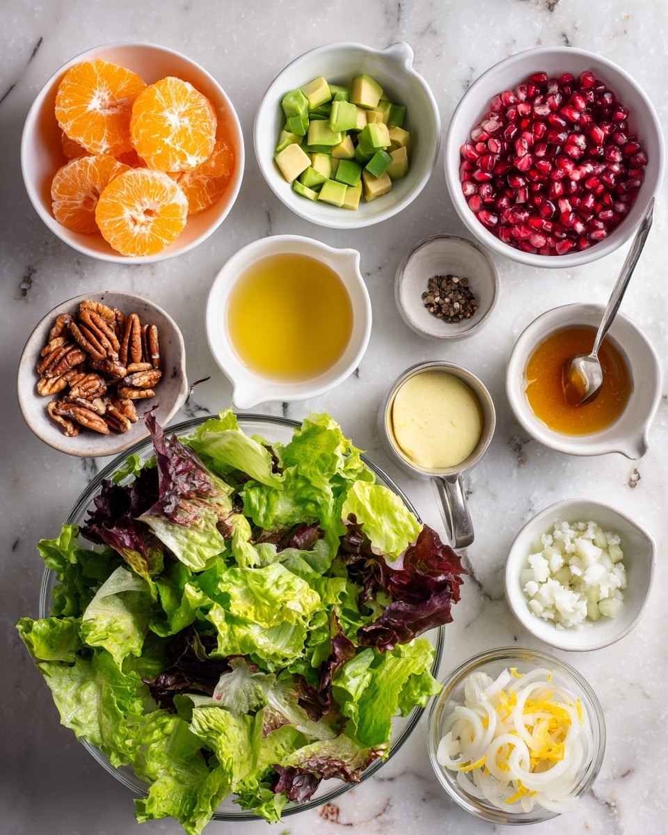 The image shows a clear glass bowl at the bottom filled with fresh, mixed green lettuce leaves with different shades of green and some dark purple leaves, textured and leafy. Surrounding the bowl are small white bowls and measuring cups, each containing different ingredients: bright orange mandarin slices on the left, vibrant red pomegranate seeds in another bowl next to it, light green diced avocado pieces, crunchy candied pecans in a small cup, creamy pale yellow dressing in another bowl, and white crumbled cheese in a metal measuring cup. Additional bowls hold peeled minced garlic, ground black pepper with salt, pale yellow vinegar or juice, golden brown liquid, and bright orange zest, all placed on a white marbled surface. A bowl of thinly sliced pale shallots is also visible. The setup is neat and colorful, with a variety of textures and colors. Photo taken with an iphone --ar 4:5 --v 7