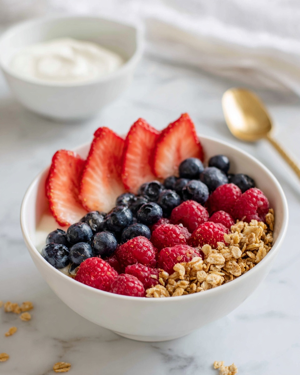 The image shows three clear glass jars filled with layers of white yogurt, fresh mixed berries including blueberries, raspberries, and sliced strawberries, golden brown granola, and white coconut flakes. Each jar has a base of yogurt, followed by a layer of mixed berries and granola, with a final topping of coconut flakes and extra berries. The jars are placed on a white marbled surface with scattered granola and blueberries around. In the front, there are white hexagonal coasters with a brown stripe pattern, each with a few blueberries on top. The focus is on the front jar, showing the detailed texture and colors of the ingredients, with soft lighting enhancing the fresh look of the dish. photo taken with an iphone --ar 4:5 --v 7