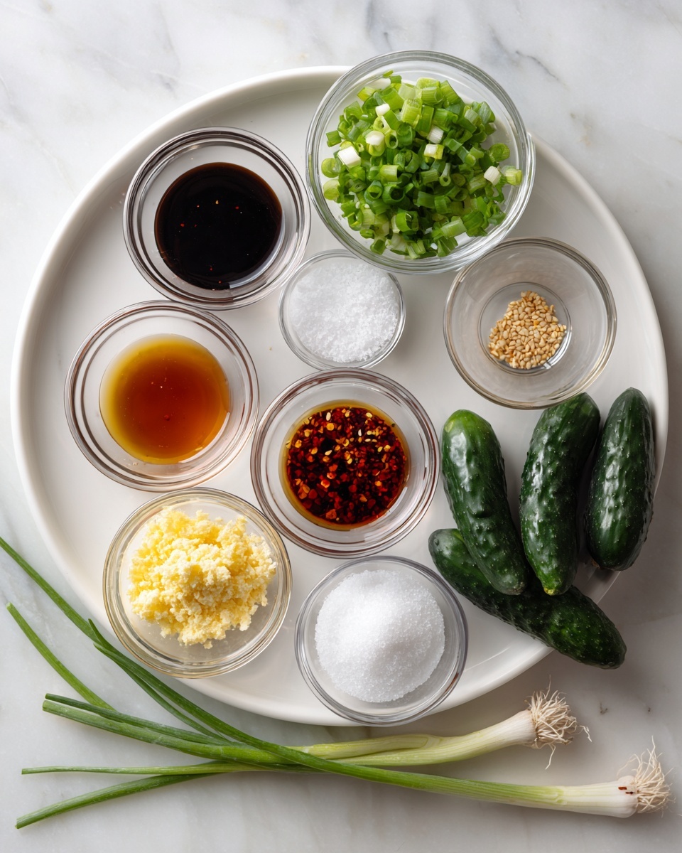 The image shows a white round plate with eight small clear glass bowls arranged in a circle. Each bowl contains a different ingredient, including dark soy sauce, chili oil with red flakes, light brown liquid, white granulated sugar, white salt, pale yellow minced garlic, clear liquid, and toasted sesame seeds. Next to the plate on a white marbled surface, there is a small clear glass bowl filled with chopped green onions and seven dark green mini cucumbers placed casually. The scene is clean and bright with natural light photo taken with an iphone --ar 4:5 --v 7