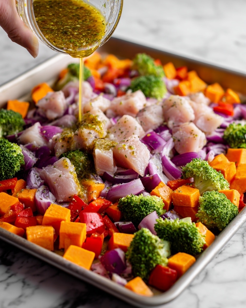 The image shows a colorful mix of roasted vegetables and white meat pieces spread out evenly on a white tray. There are bright orange cubes of sweet potatoes, light green broccoli florets, chunks of red bell peppers, and purple pieces of onion. The white meat pieces, seasoned with herbs, are scattered evenly among the vegetables. The textures show a mix of soft, roasted surfaces with slight browning. The whole dish is set on a white marbled surface. photo taken with an iphone --ar 4:5 --v 7