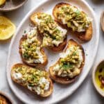 Baked Feta and Artichoke Dip with Olive Gremolata Recipe