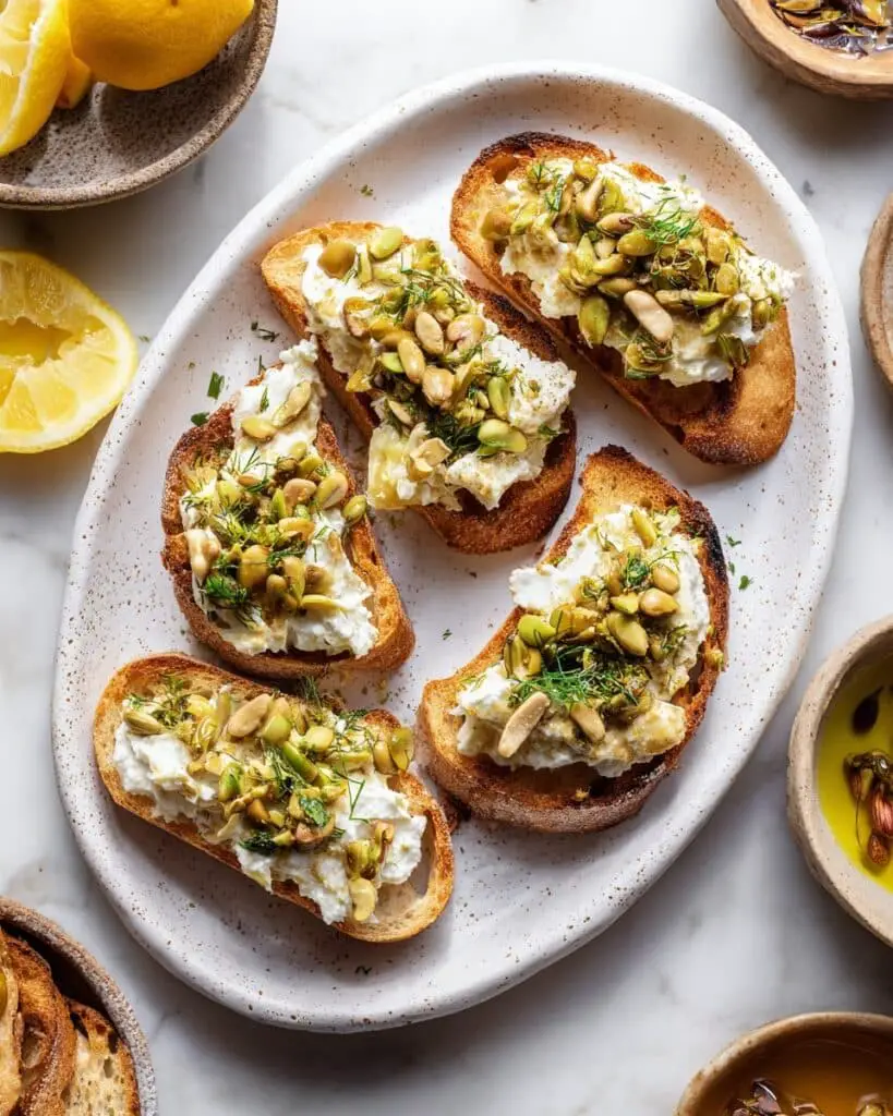 Baked Feta and Artichoke Dip with Olive Gremolata Recipe