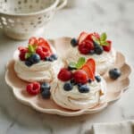 Classic Pavlova with Fresh Fruit and Whipped Cream Recipe