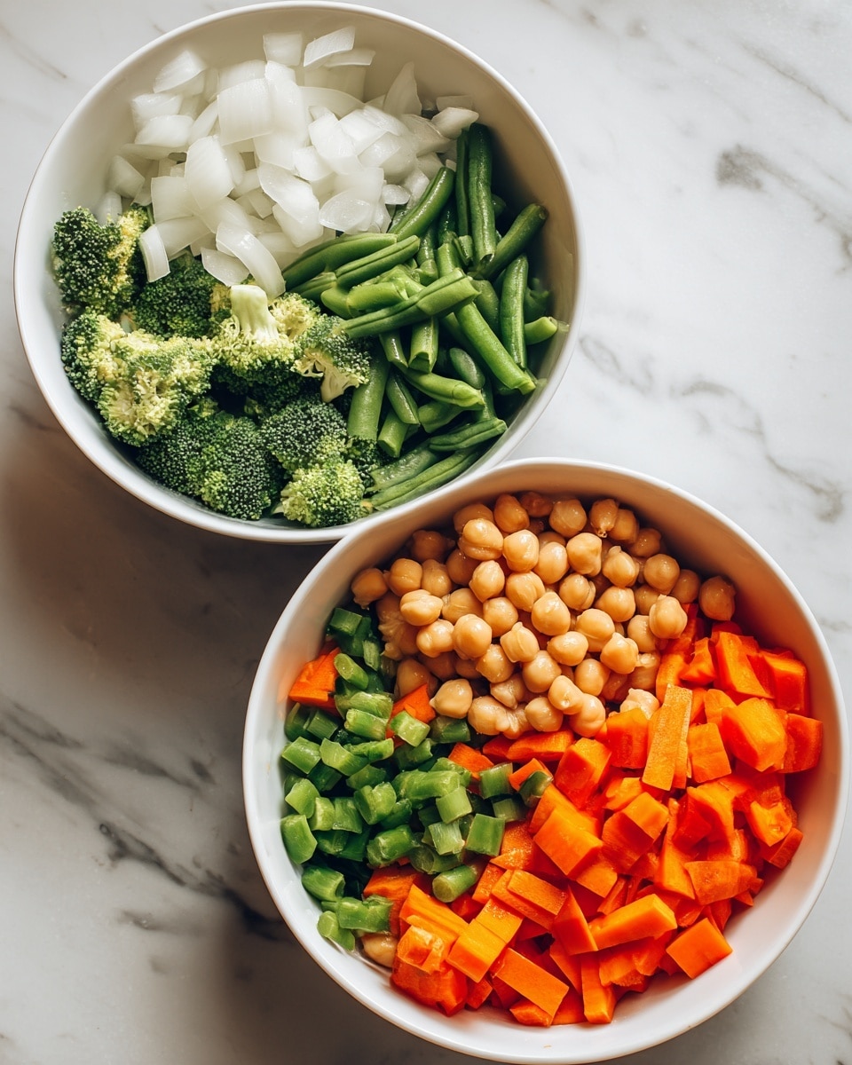 The image shows two white bowls on a white marbled surface. The first bowl is filled with five separate layers of raw vegetables: bright orange carrot slices at the bottom right, white onion pieces at the bottom left, green beans chopped into small pieces at the top left, diced green bell peppers at the top right, and fresh green broccoli florets in the middle. The second bowl contains all the vegetables mixed together with the addition of beige chickpeas, showing a colorful mix of green broccoli, orange carrots, white onions, green beans, green bell peppers, and chickpeas, creating a textured, vibrant medley. Photo taken with an iphone --ar 4:5 --v 7