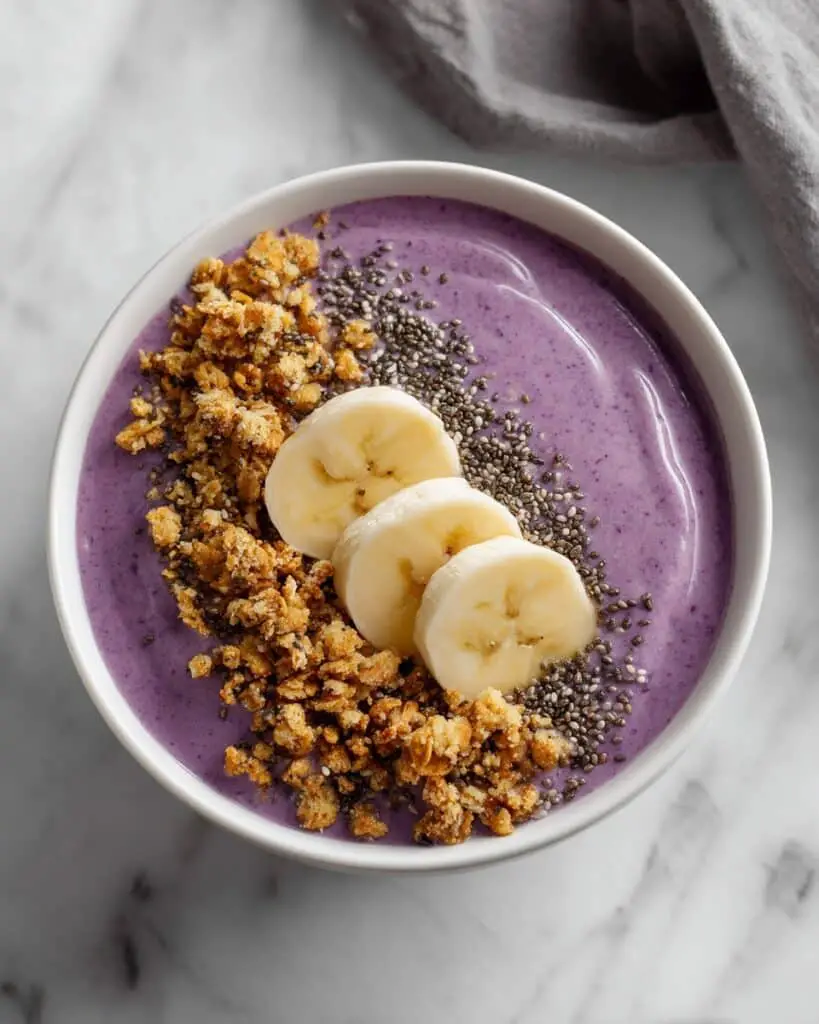 Pitaya Bowl with Banana, Strawberry, and Nut Toppings Recipe