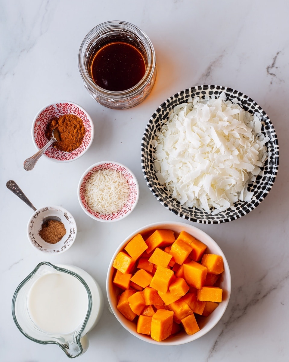 A top-down view of ingredients on a white marbled surface includes a small glass jar of dark amber liquid at the top left, a white bowl with a black checkered pattern filled with white shredded coconut to the right, and below the jar is another white bowl with the same black checkered pattern filled with bright orange cubed fruit pieces. Near the bottom is a clear glass jug with white liquid inside, partially shown, and to the left are a set of small white and red patterned bowls, one holding light brown and darker brown powdered spices and another measuring spoon with white rice grains. The arrangement is set with clean and bright lighting. photo taken with an iphone --ar 4:5 --v 7