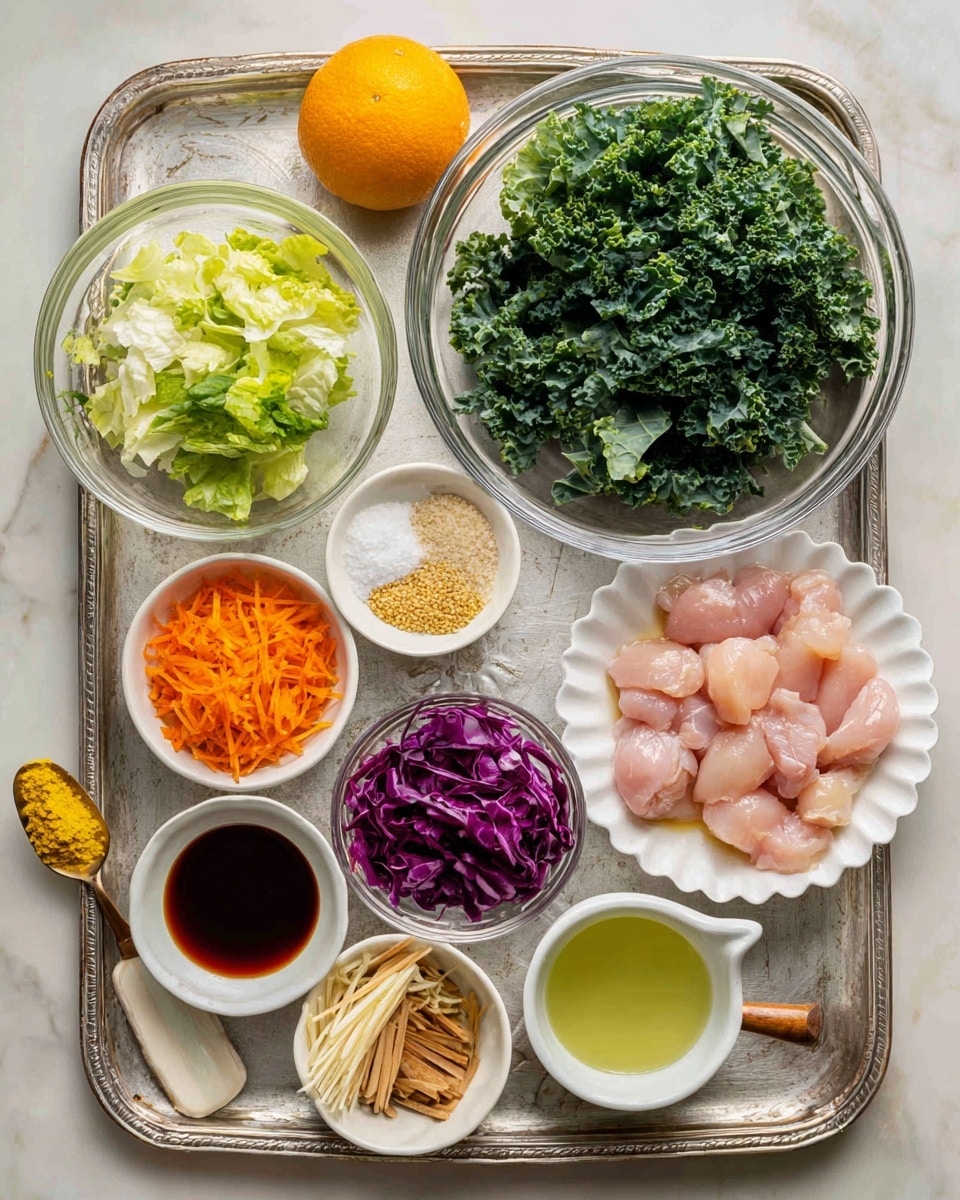 A white bowl filled with layers of fresh salad starts with a base of green leafy kale at the bottom, topped with five distinct sections: shredded bright orange carrots on the left front, a pile of crunchy light tan noodle sticks on the left back, slices of golden brown grilled chicken pieces on the right back, crispy white sesame seed crackers near the center left, and finely sliced purple cabbage covering the right front side. A small silver sauce cup with rich golden brown dressing rests on top near the chicken. The bowl sits on a white marbled surface, and in the softly blurred background, there is another white bowl with similar ingredients and dressing, along with small white dishes holding more noodles and crackers, plus a halved orange. Photo taken with an iphone --ar 4:5 --v 7