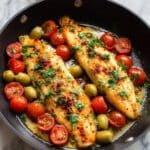 Poached Sea Bass with Tomatoes, Olives, and Parsley Recipe