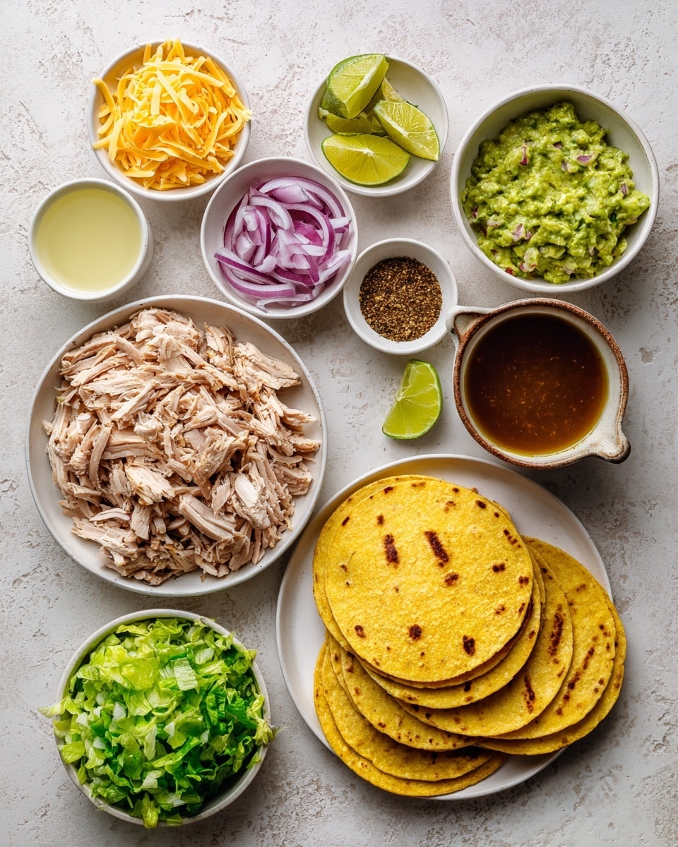 This image shows a top-down view of various taco ingredients arranged on a white marbled surface. In the center, there is a white bowl filled with shredded light brown cooked chicken. To the right of the chicken bowl is a white plate stacked with several yellow corn tortillas with grill marks on top. Around these key items, there are smaller bowls with bright green chopped lettuce, light green guacamole with a smooth texture, and thin rings of purple-red onion. Other elements include a bowl of shredded yellow-orange and white cheese, a small cup of light yellow lime juice, a tiny dark dish of brown spice mix, a small container with green cilantro sauce, and a cup filled with brown broth or sauce. The arrangement is clean and colorful, showing fresh textures of each ingredient clearly. photo taken with an iphone --ar 4:5 --v 7