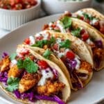 Fried Chicken Tacos with Lime Crema and Red Cabbage Recipe