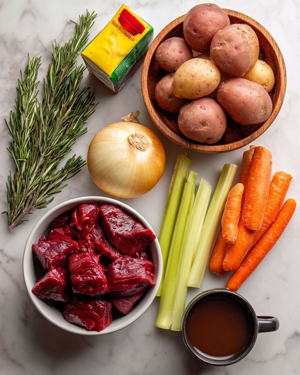 A group of raw soup ingredients is shown on a white marbled surface: a white bowl with deep red chunks of raw beef sitting towards the bottom left, next to a bundle of fresh green rosemary sprigs. Above that is a wooden bowl filled with smooth, round red potatoes. To the right of the potatoes is a golden-brown whole onion and a bulb of white garlic. Next to these are two bright orange carrots and two pale green stalks of celery lying side by side. A green carton of beef broth stands upright near the top left corner. A yellow and red tube of tomato paste is placed diagonally near the center. At the bottom right, a small dark brown cup filled with a dark liquid is visible. photo taken with an iphone --ar 4:5 --v 7