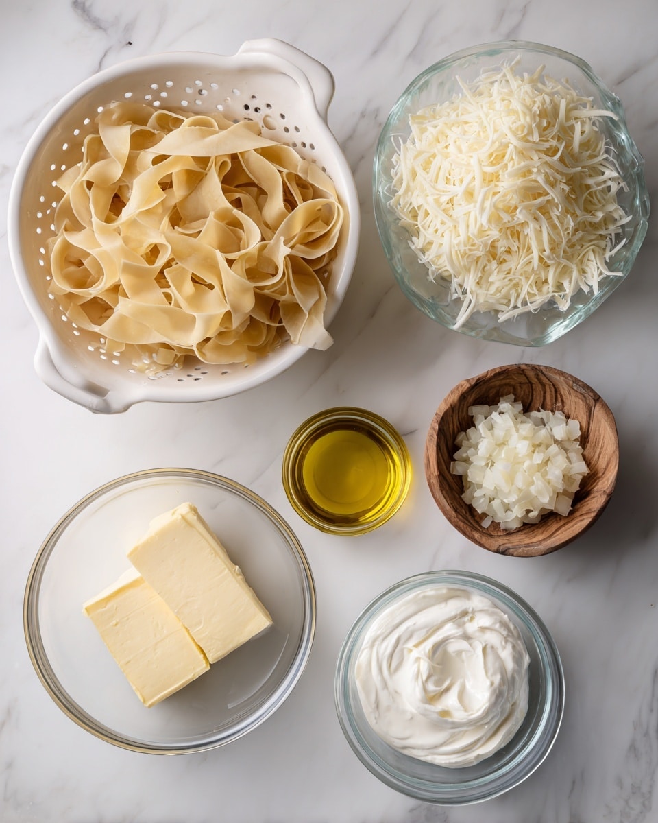 A large white pan with a creamy pale yellow liquid filling the base serves as the main visual. On the left side near the center, there is a small pile of fine shredded white coconut adding a textured layer. To the right of the coconut, a small pool of golden yellow oil or melted butter creates a shiny, smooth patch on the surface. The creamy liquid shows slight bubbles and a smooth texture across the pan. The top view highlights the simplicity and softness of the ingredients with a white marbled background. Photo taken with an iphone --ar 4:5 --v 7